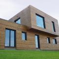 Maison contemporaine a toit plat construite en ossature bois