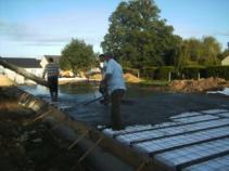 Coulage dalle beton pour construction maison bois 1