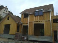 Couverture en tuiles sur maison en bois dans les yvelines