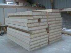 Fabrication murs ossature bois construction maison artisanale