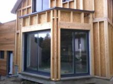 Pose fenetres sur maison bois