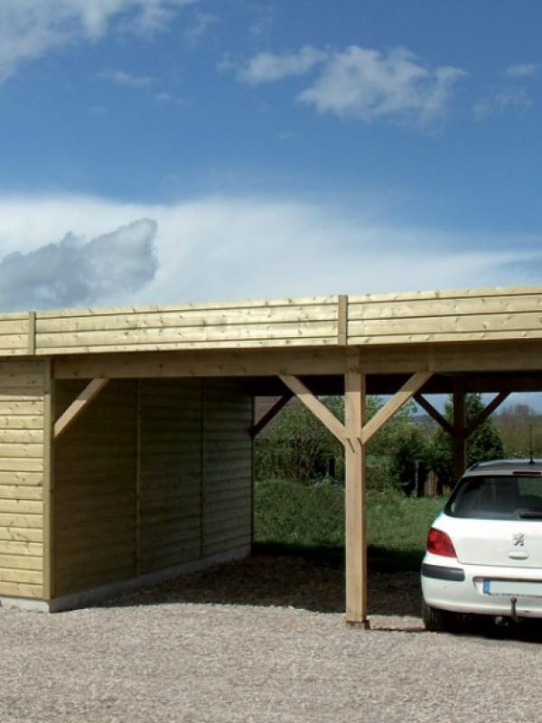 Garage bois toit plat fabriqué en ossature bois