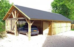 Grand garage en bois avec abri en ossature bois